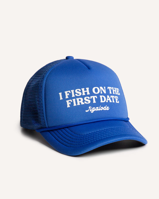 Side shot of the First Date trucker. It's a royal blue foam trucker hat. The front is printed with "I Fish On The First Date".