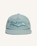Light blue fishing snapback hat with a bonefish patch on the front.