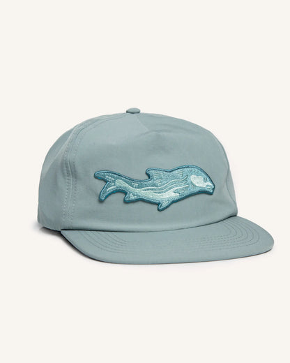 Light blue fishing snapback hat with a bonefish patch on the front.