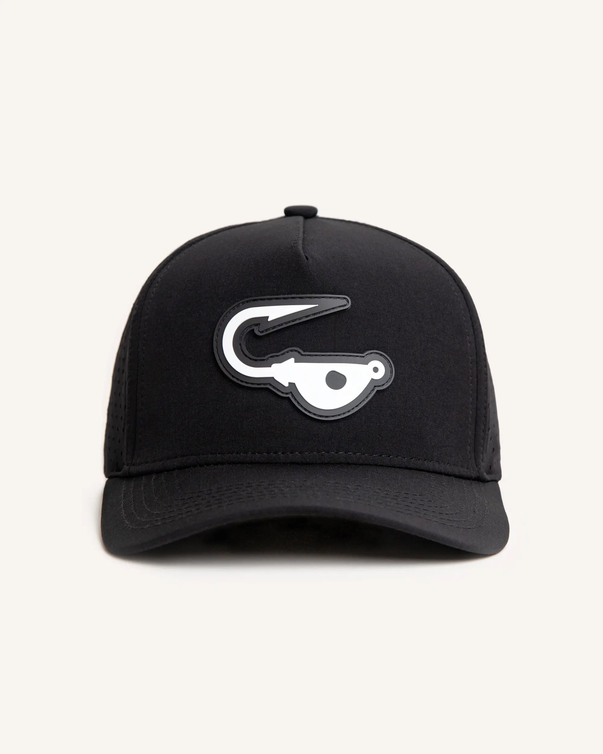 Black performance fishing snapback with perforated holes and a rubber jigalode patch sewn in the front.