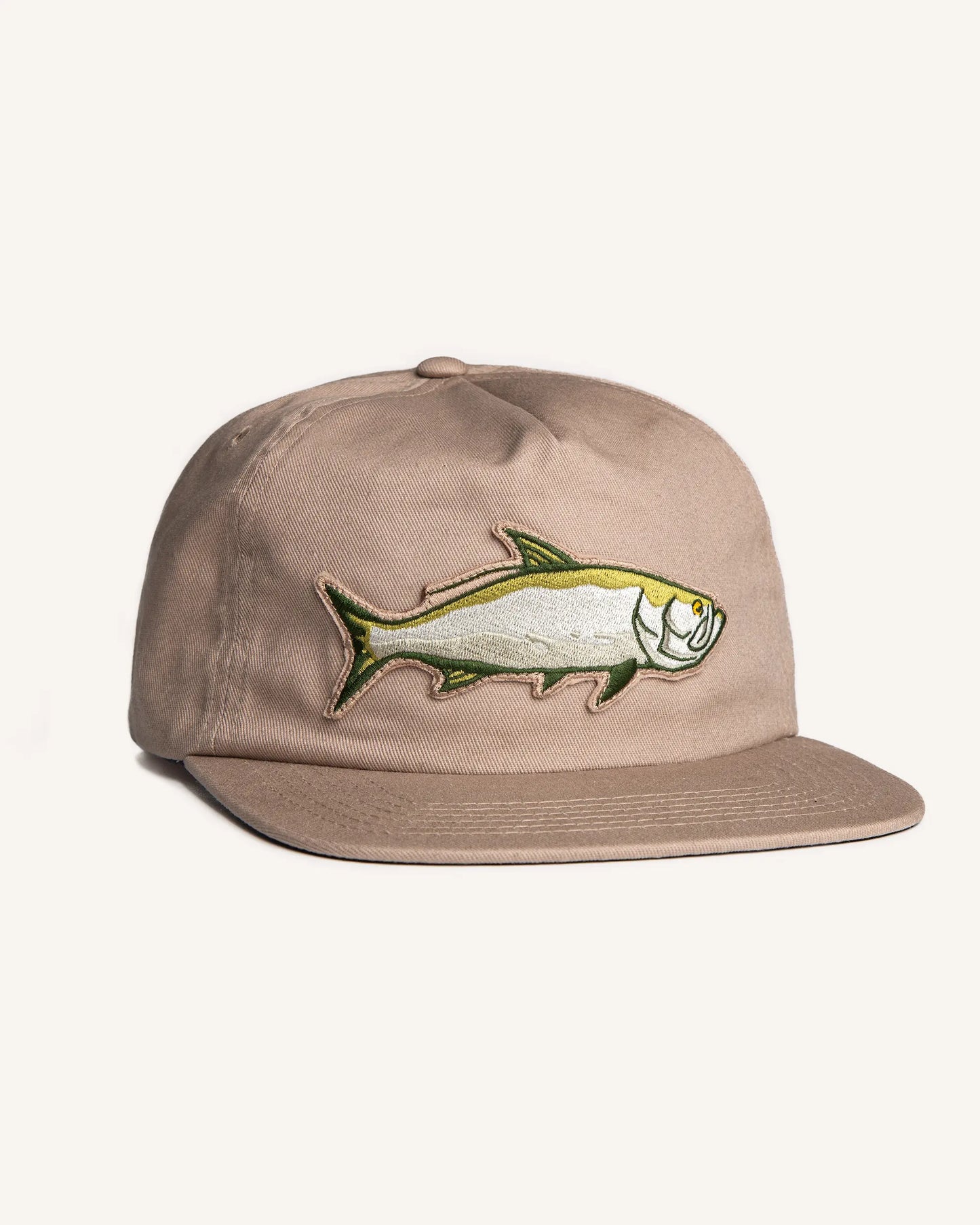 Front front view of the Jigalode "Tarpon" Snapback fishing hat. The hat is a tan/khaki unstructured flat brim with a large tarpon patch in the front.